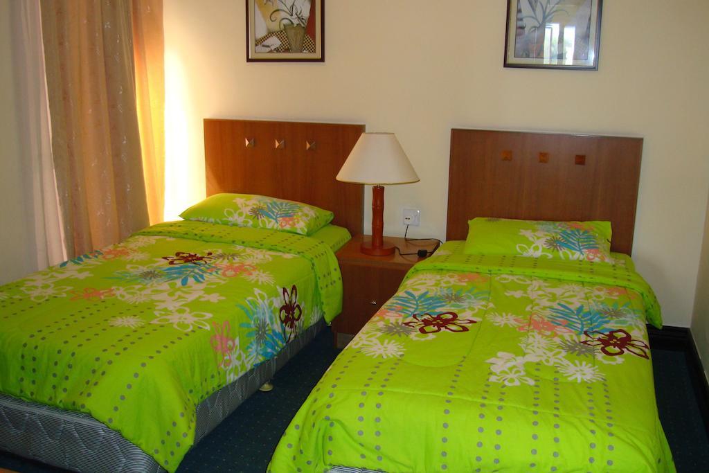 Dorcas Service Apartment - Marina Court Kota Kinabalu Habitación foto