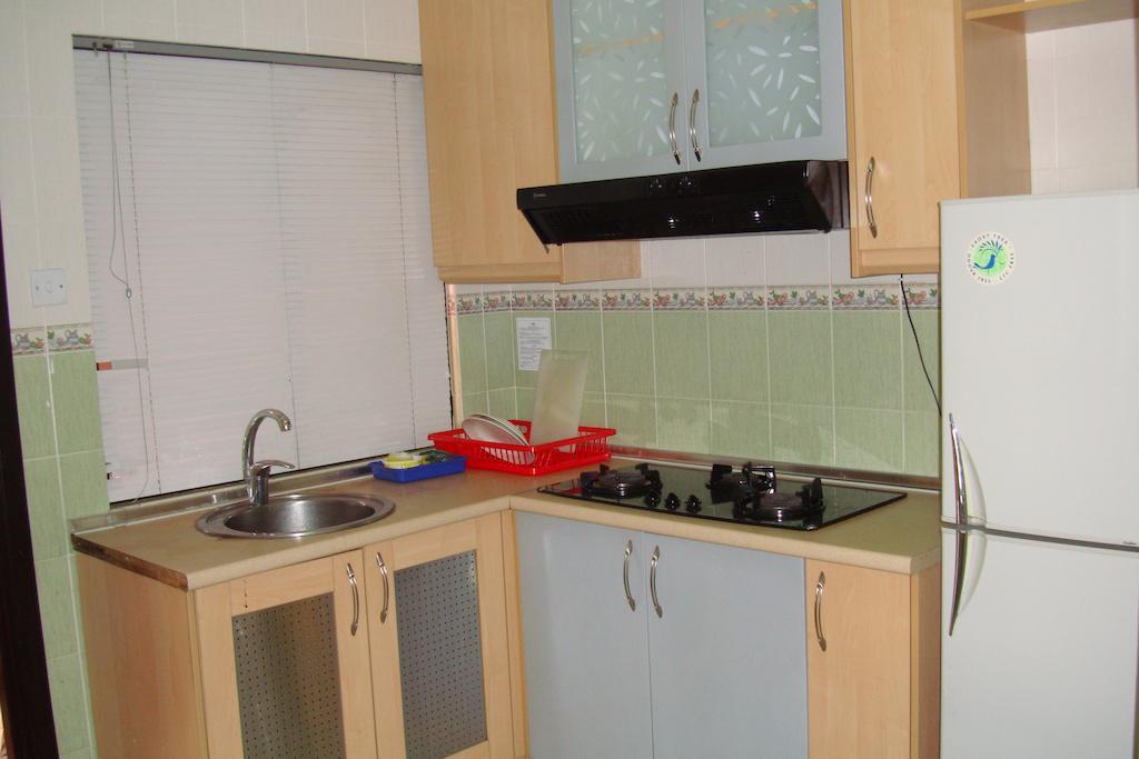 Dorcas Service Apartment - Marina Court Kota Kinabalu Habitación foto